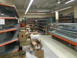 Перевезли продуктовый магазин в Рудном без остановки торговли.